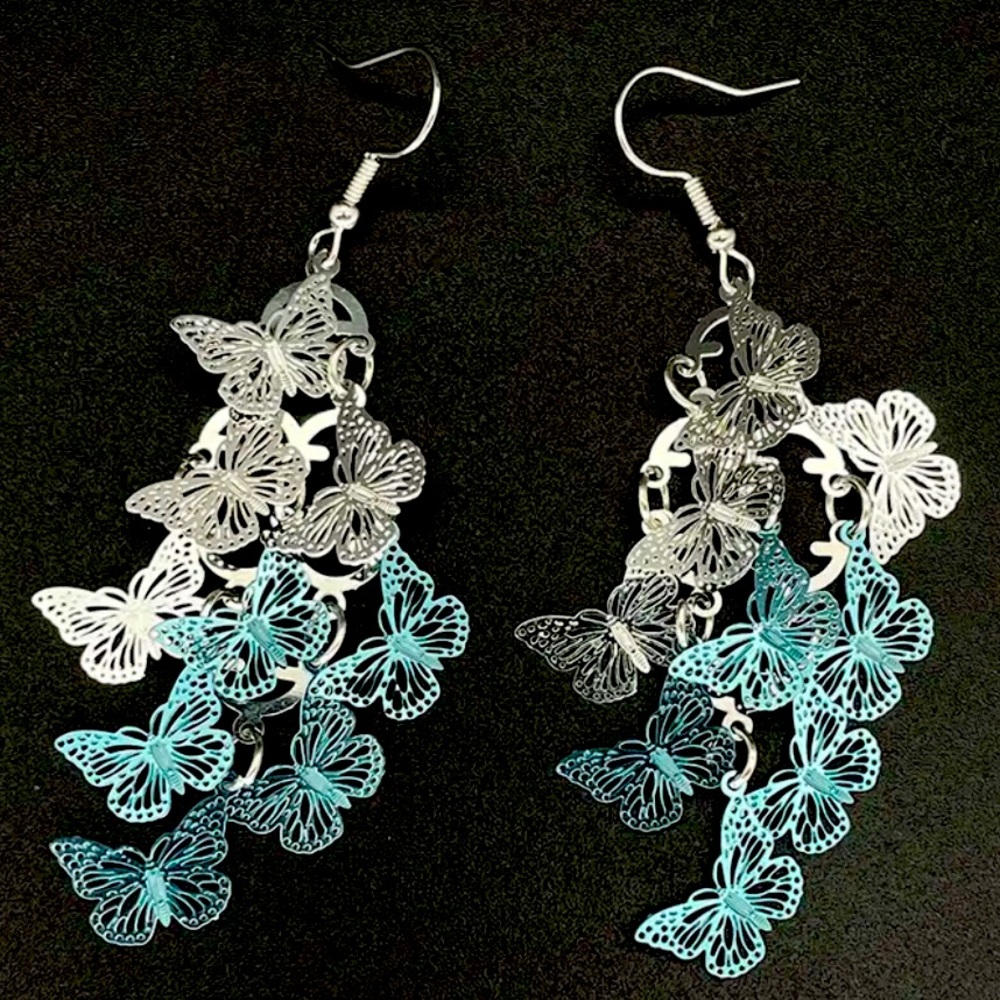 Silver and teal layered butterfly silver tone earrings